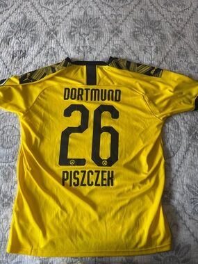 Puma Yellow and Black Football Jersey Collar Detail